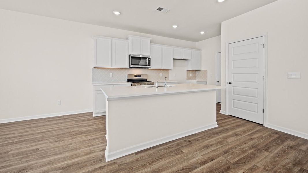 Representative furnished interior of a home built from the Edmon by D.R. Horton in Poplar Preserve, Newnan (Image 7).