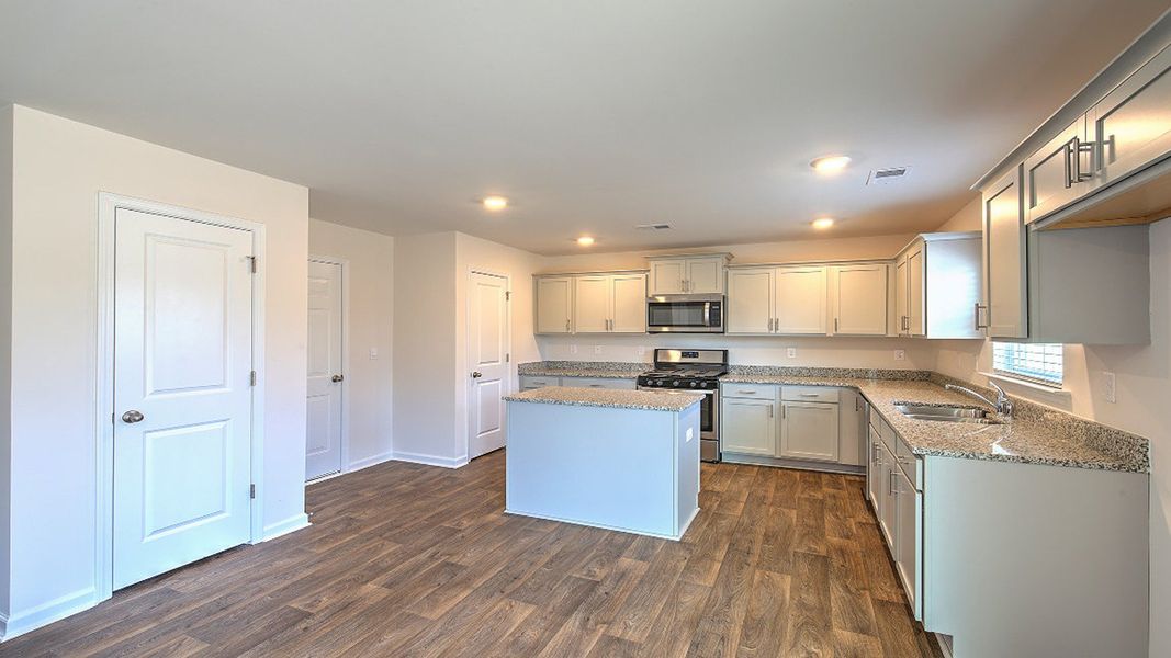 Furnished interior view inside a new home in Grand Oaks, Columbia (Image 4). Furnished interior view inside a new home in Grand Oaks, Columbia (Image 4).