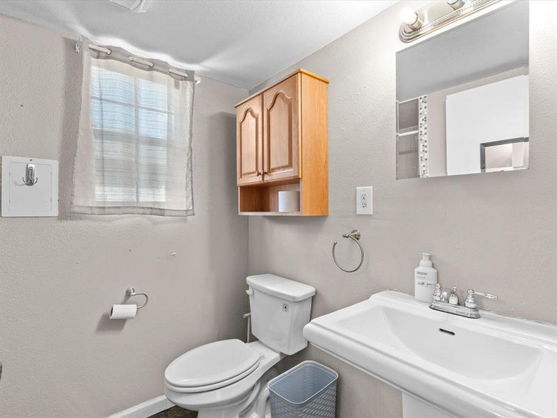 Bathroom with a sink and toilet Bathroom with a sink and toilet