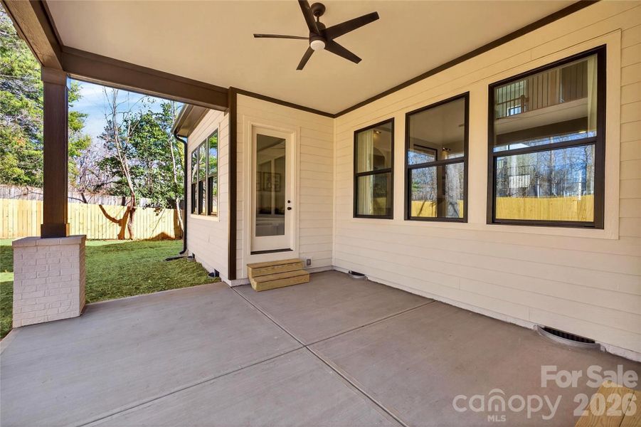 Exterior details and patio area of a home in , Belmont (Image 4).
