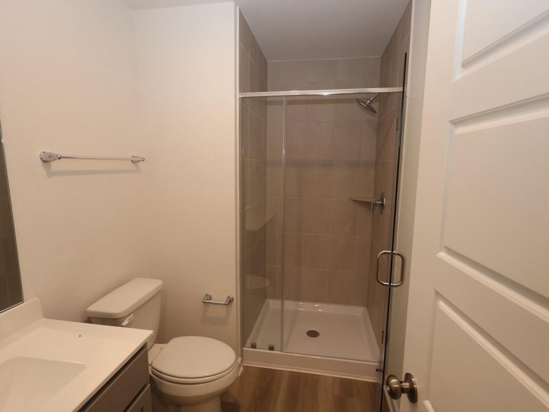 Furnished interior view inside a new home in Pinewood at Grand Texas, New Caney (Image 6).