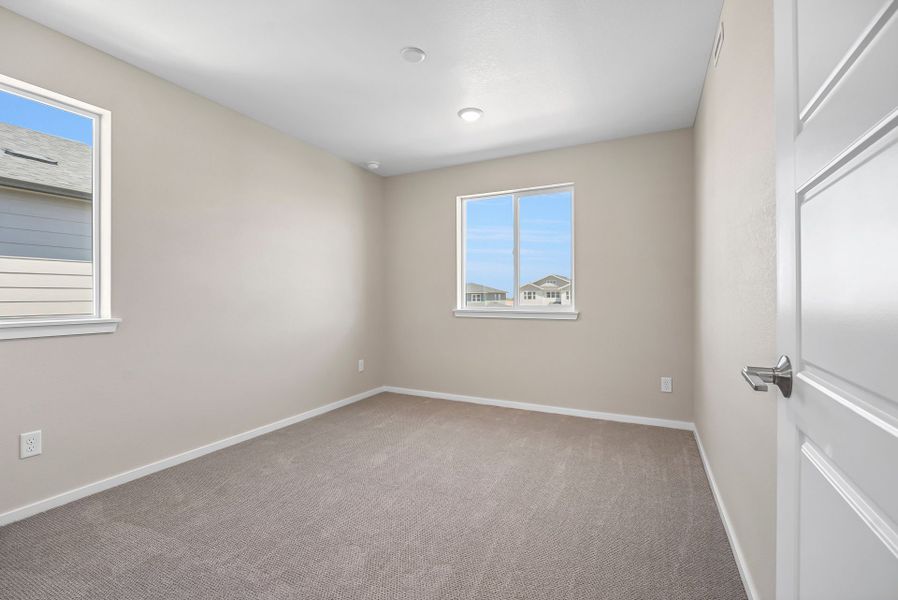 Spacious, unfurnished interior of a new home in Barefoot Village, Firestone (Image 20).