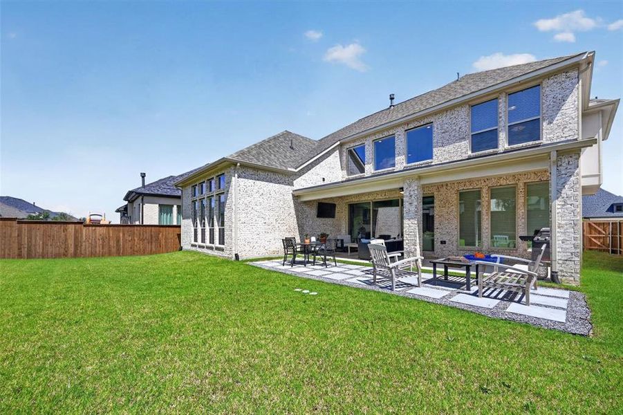 Exterior details and patio area of a home in The Parks at Wilson Creek, Celina (Image 4).