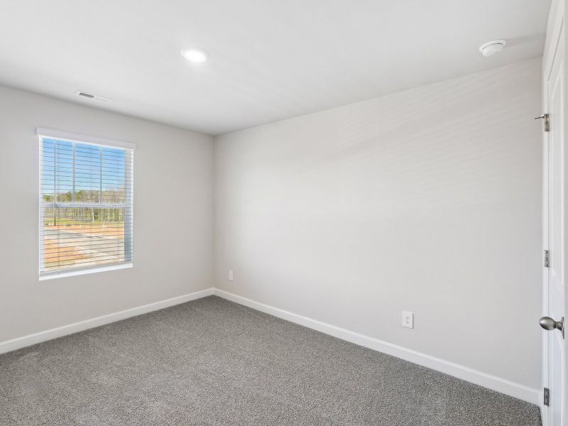 This secondary bedroom is perfect for your work-from-home office.