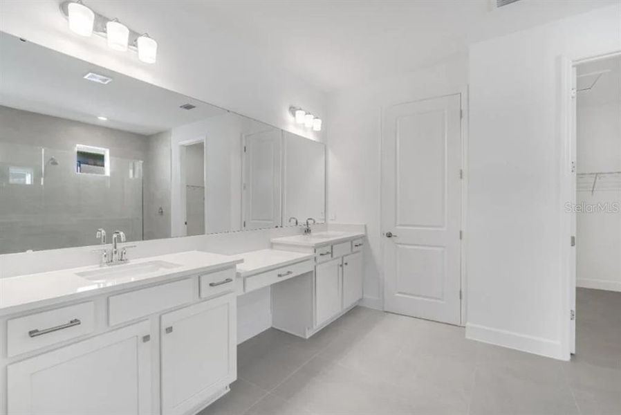 Furnished interior view inside a new home in Harvest at Ovation, Winter Garden (Image 15).