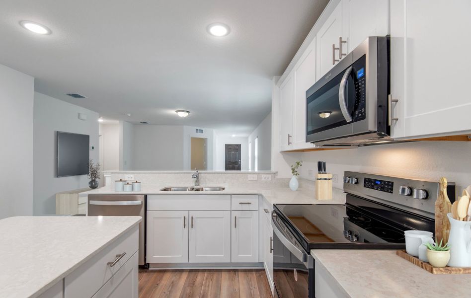 Spacious eat-in kitchen designed with a large island for dining