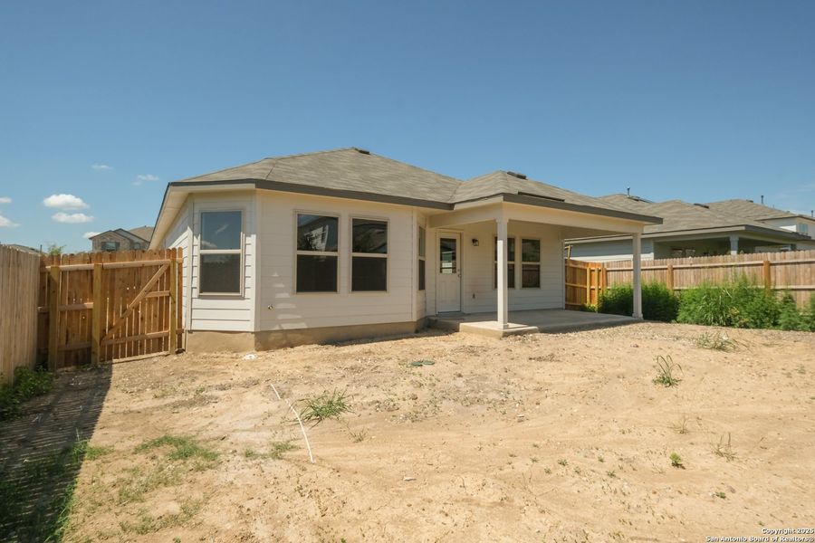 Front exterior of a new home in Blue Ridge Ranch, San Antonio, TX, highlighting curb appeal (Image 23). Front exterior of a new home in Blue Ridge Ranch, San Antonio, TX, highlighting curb appeal (Image 23).