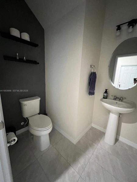 Furnished interior view inside a new home in , Lauderdale Lakes (Image 7).