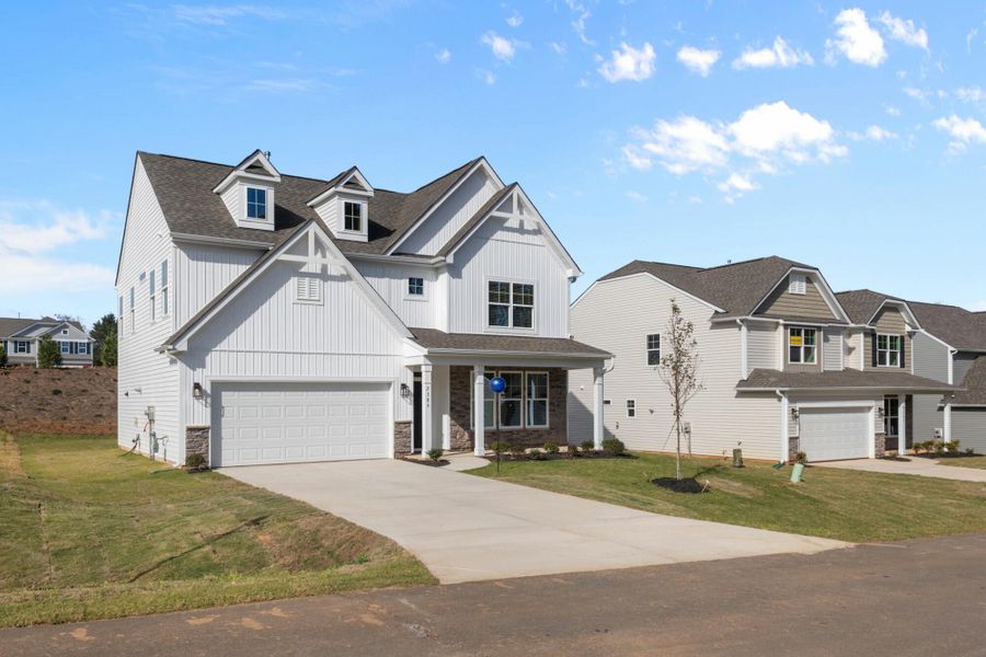 Front exterior of a new home in Pisgah Park, Kernersville, NC, highlighting curb appeal (Image 24).