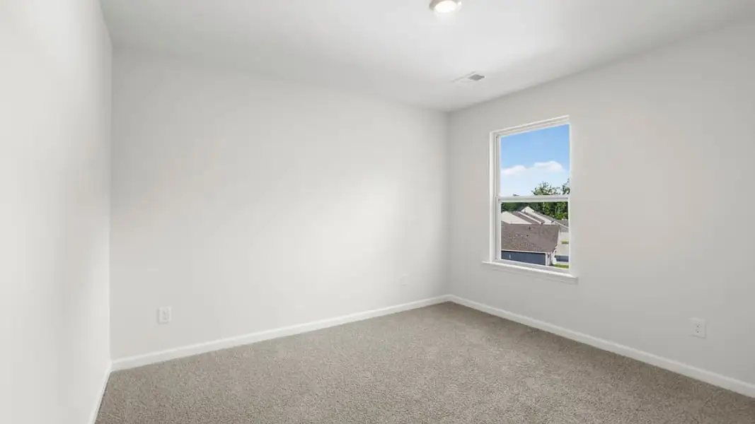Spacious, unfurnished interior of a new home in Chestnut Ridge, Greenville (Image 28).