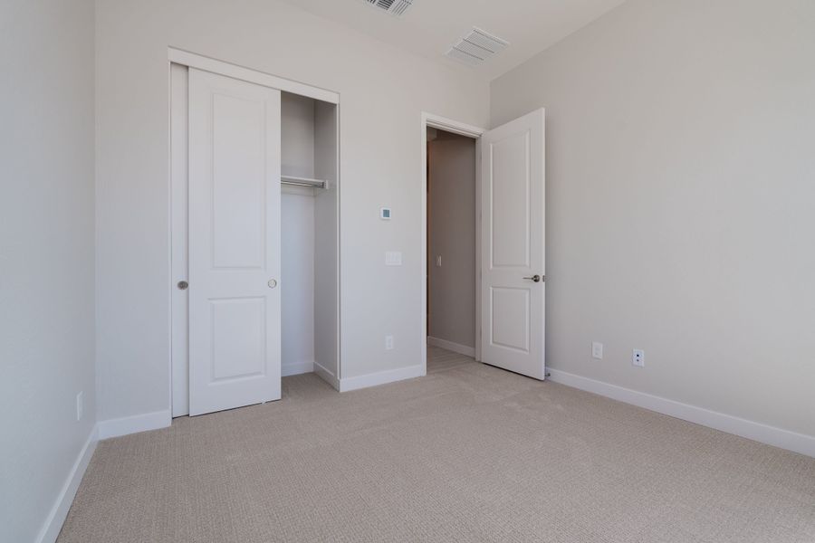 Spacious, unfurnished interior of a new home in Waterston Central, Gilbert (Image 16). Spacious, unfurnished interior of a new home in Waterston Central, Gilbert (Image 16).