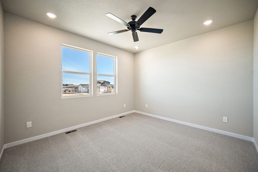 Spacious, unfurnished interior of a new home in Trails at Aspen Ridge-3, Colorado Springs (Image 29).