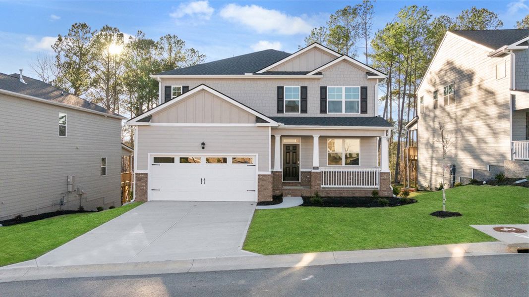 Front exterior of a new home in Southwind Village, Evans, GA, highlighting curb appeal (Image 2).