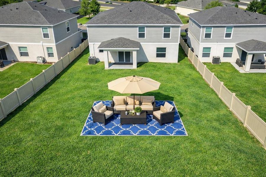 Exterior details and patio area of a home in Broadleaf, Parrish (Image 3).