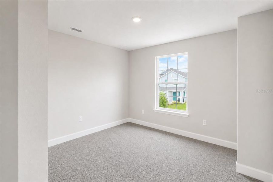 Spacious, unfurnished interior of a new home in Harmony Central, St. Cloud (Image 15).