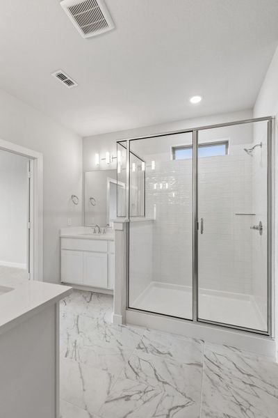 Primary Bathroom in the Winters home plan by Trophy Signature Homes – REPRESENTATIVE PHOTO