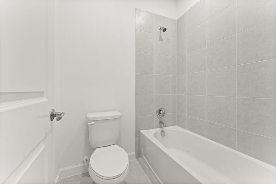 Furnished interior view inside a new home in Tradition - Kenley, Port St. Lucie (Image 8).