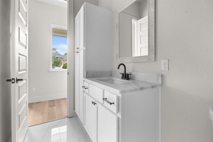 Bathroom featuring vanity