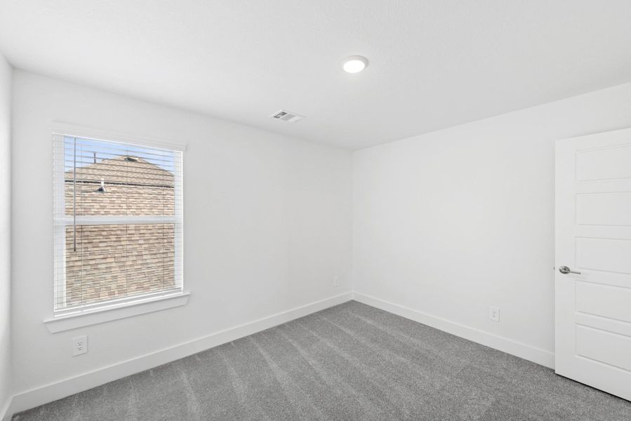 Spacious, unfurnished interior of a new home in Sorella, Tomball (Image 17).