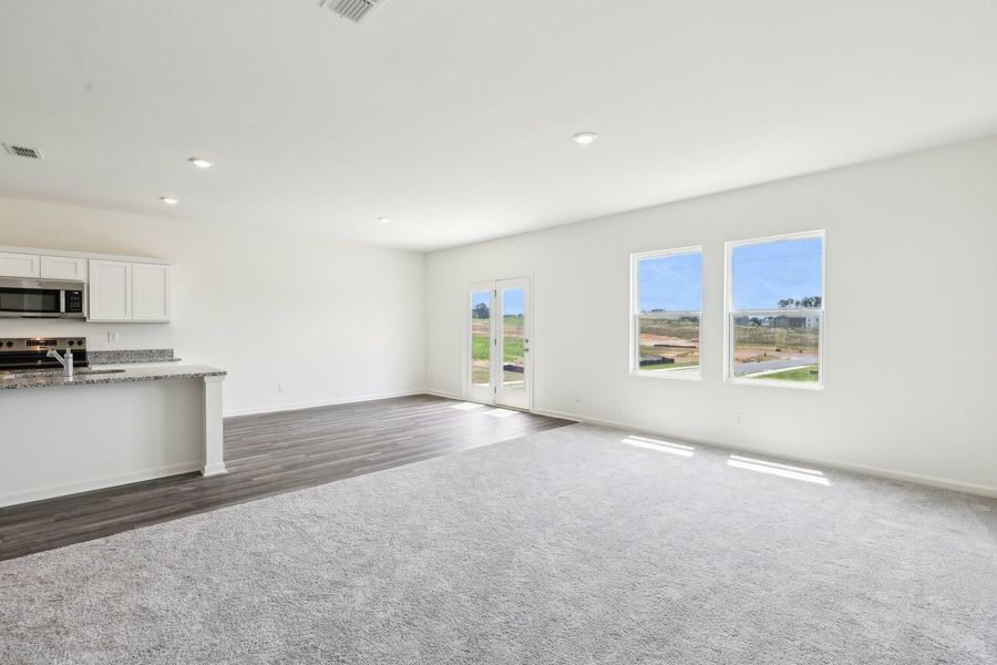 Representative unfurnished interior of a home built from the Galileo by Starlight Homes in Harrington Trails at The Canopies, New Caney (Image 29).