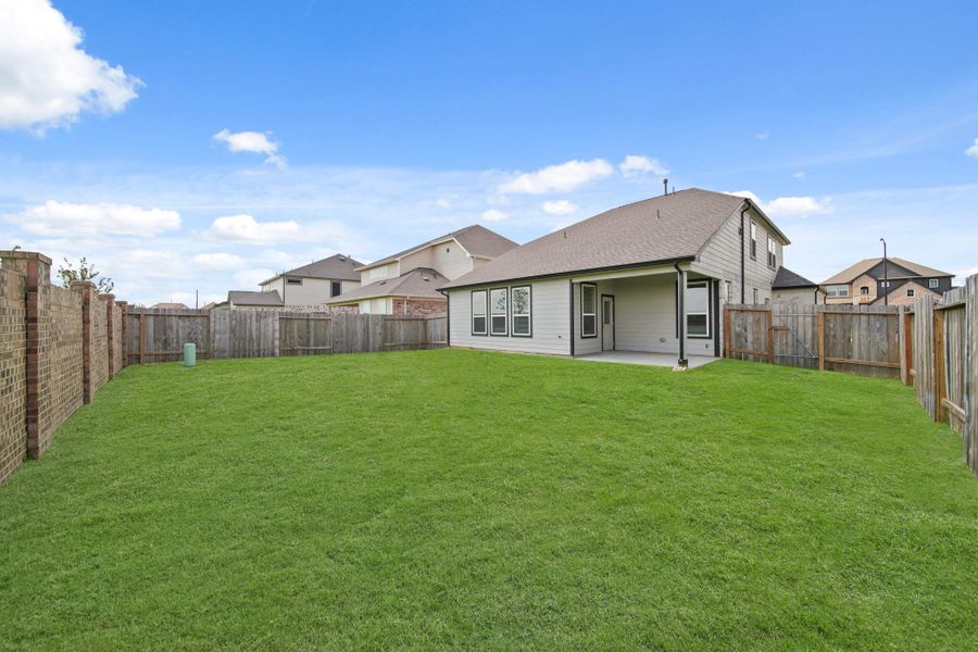 Front exterior of a new home in Beacon Hill, Waller, TX, highlighting curb appeal (Image 16).
