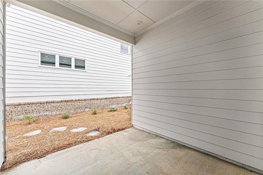 Exterior details and patio area of a home in Promenade at Sawnee Village, Cumming (Image 4).