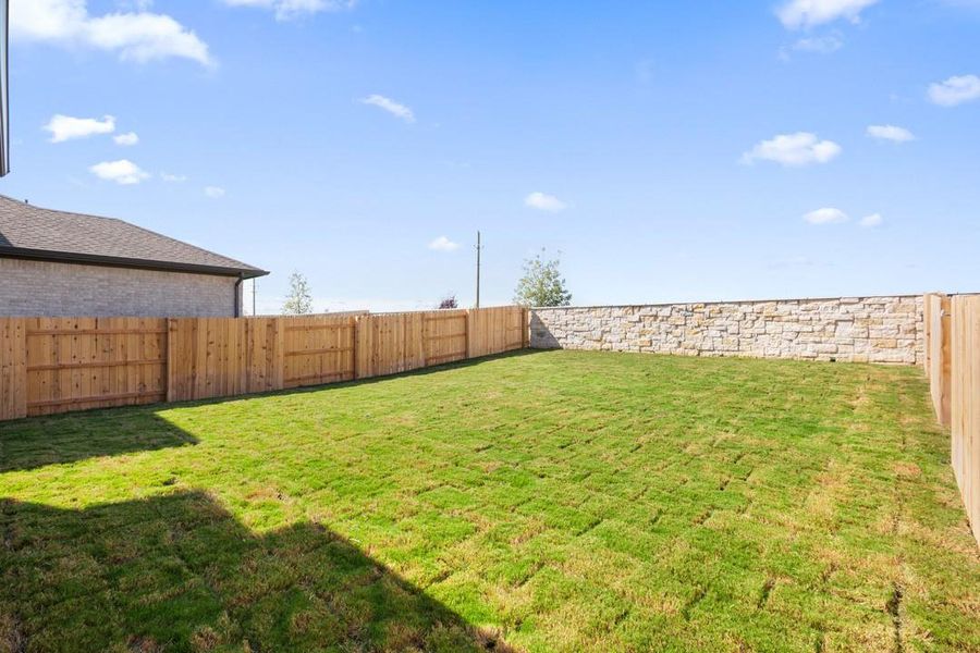 Exterior details and patio area of a home in Flora, Hutto (Image 17).