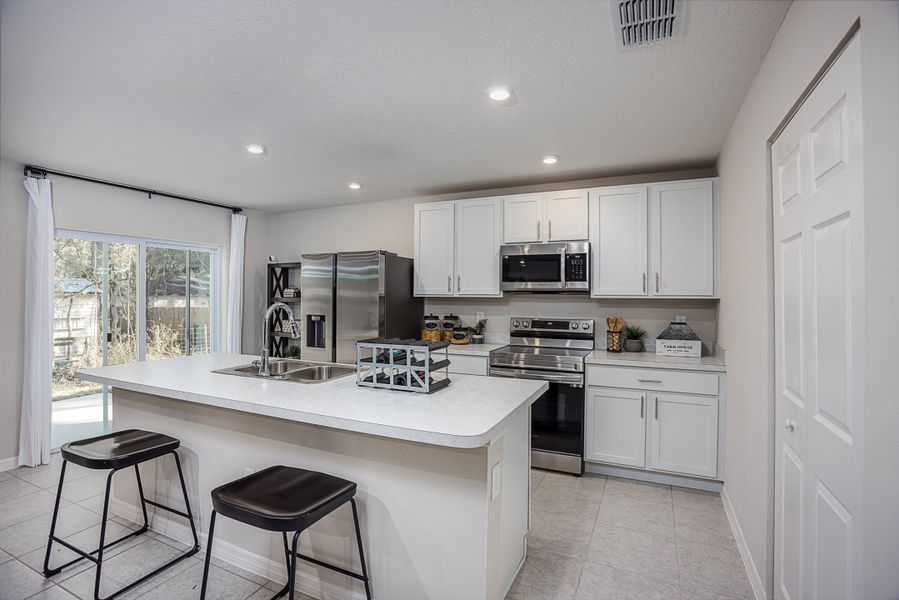 Representative furnished interior of a home built from the Orchid by Maronda Homes in Coastal Communities, Edgewater (Image 4).