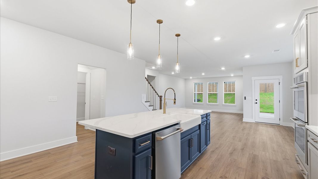 Top-notch kitchen featuring pendant lighting over a statement 9-foot island located in Piedmont, SC Top-notch kitchen featuring pendant lighting over a statement 9-foot island located in Piedmont, SC