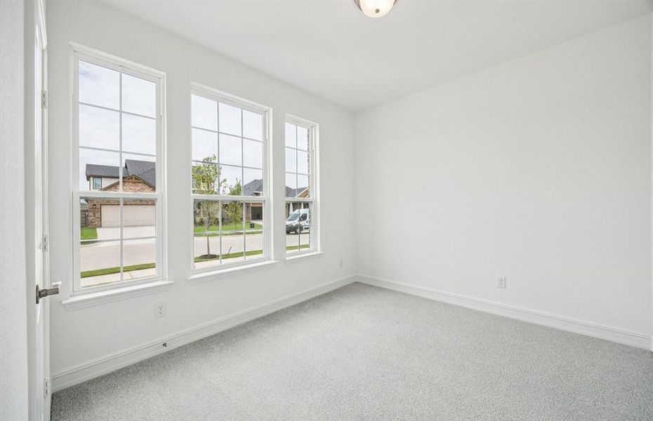 Spacious secondary bedroom features ample closet space *Real home pictured Spacious secondary bedroom features ample closet space *Real home pictured