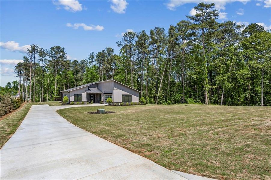 Front exterior of a new home in , Marietta, GA, highlighting curb appeal (Image 28).