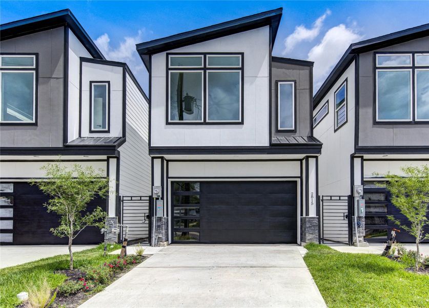 Front exterior of a new home in , Houston, TX, highlighting curb appeal (Image 22).