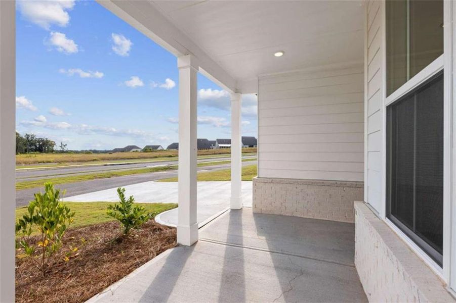 Exterior details and patio area of a home in The Estates at Gainesville Township, Gainesville (Image 3).