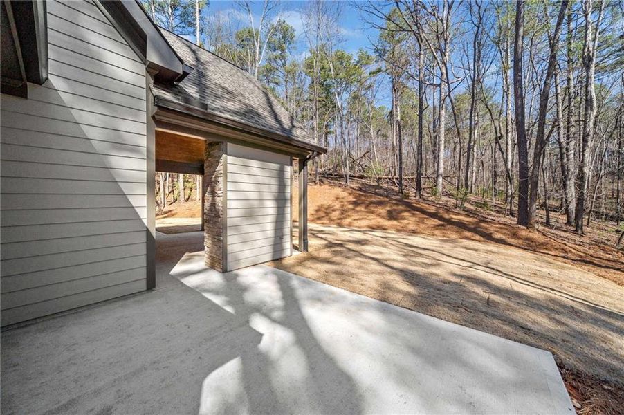 Exterior details and patio area of a home in , Ellijay (Image 24).
