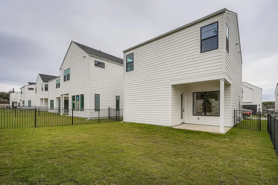 Exterior details and patio area of a home in Novel, Austin (Image 2). Exterior details and patio area of a home in Novel, Austin (Image 2).