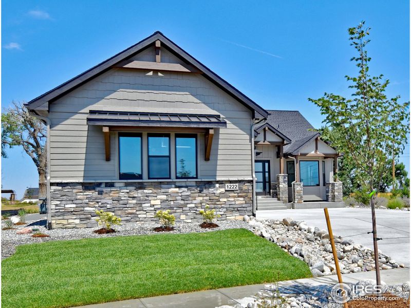 Front exterior of a new home in , Berthoud, CO, highlighting curb appeal (Image 27).