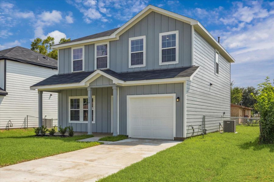 Front exterior of a new home in , Texas City, TX, highlighting curb appeal (Image 16). Front exterior of a new home in , Texas City, TX, highlighting curb appeal (Image 16).