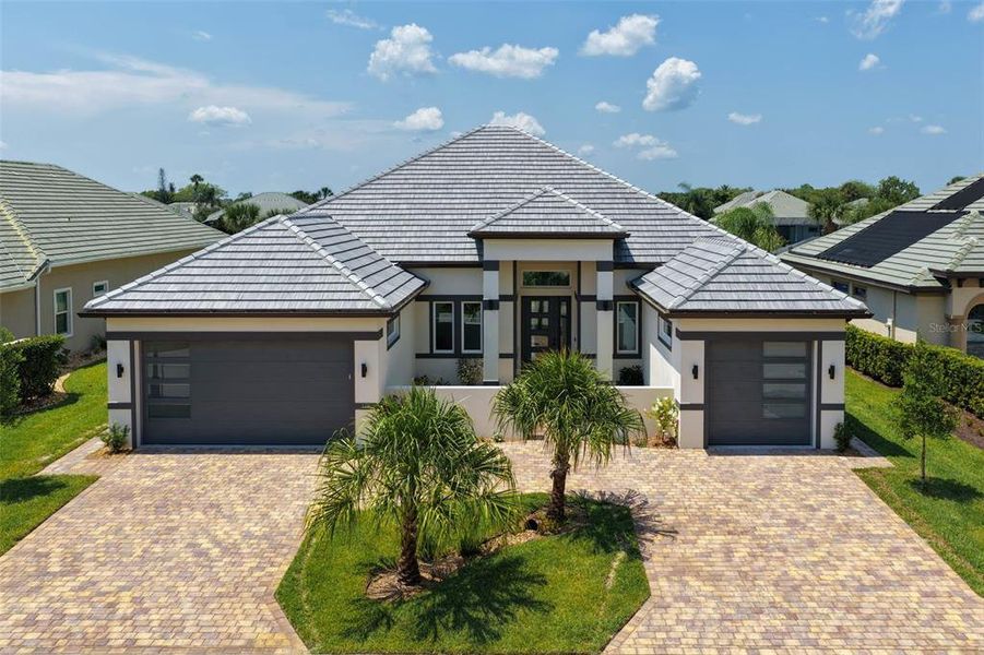 Front exterior of a new home in , Palm Coast, FL, highlighting curb appeal (Image 2).