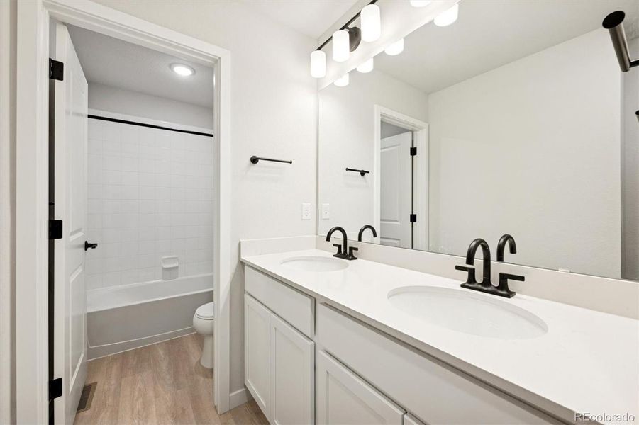 Furnished interior view inside a new home in Coyote Creek, Fort Lupton (Image 11).