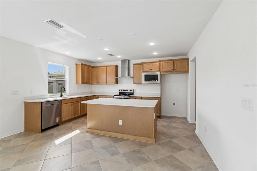 Furnished interior view inside a new home in Avalon West, Spring Hill (Image 12).