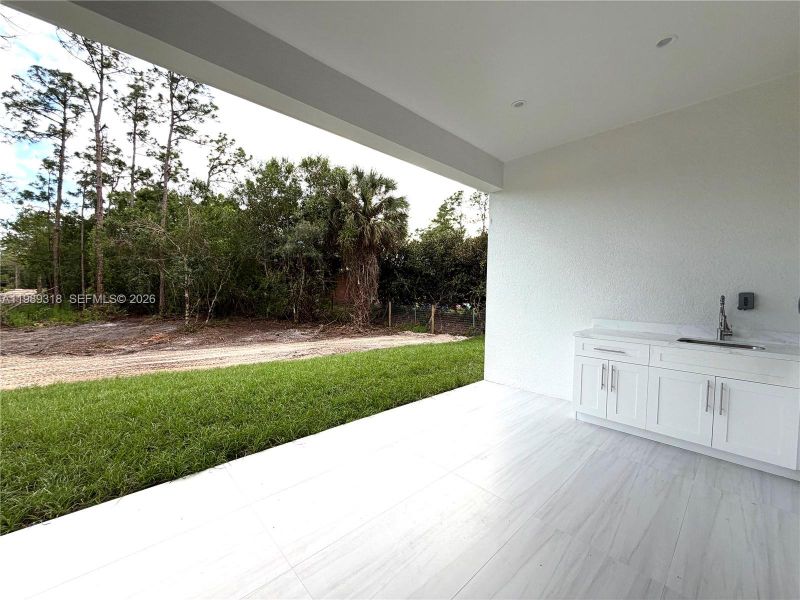 Exterior details and patio area of a home in , Naples (Image 3). Exterior details and patio area of a home in , Naples (Image 3).