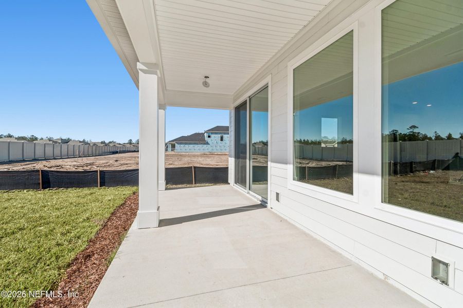 Exterior details and patio area of a home in Tributary 50', Yulee (Image 3).