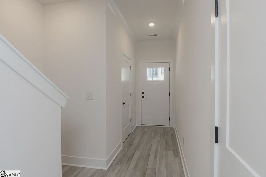Representative unfurnished interior of a home built from the 1568 Townhome by Adams Homes in Parkstone Place Townhomes, Roebuck (Image 8). Representative unfurnished interior of a home built from the 1568 Townhome by Adams Homes in Parkstone Place Townhomes, Roebuck (Image 8).