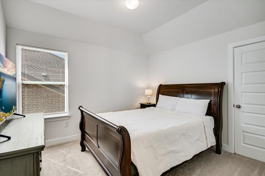 One of three upstairs bedrooms