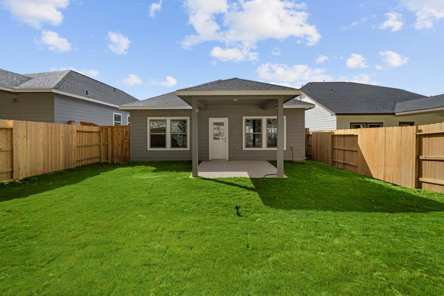 Exterior details and patio area of a home in Westridge Cove, Conroe (Image 3).