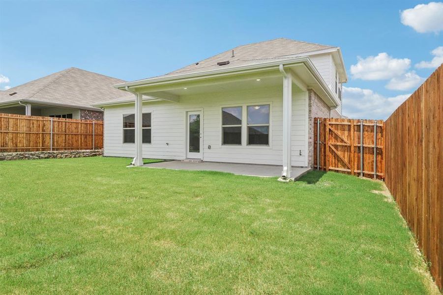 Front exterior of a new home in Westmoor, Sherman, TX, highlighting curb appeal (Image 15).