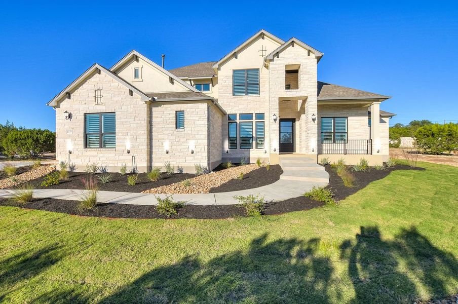 Representative exterior photo of a completed home built from the Madera II by Giddens Homes in Scofield Farms Estates, Georgetown, TX (Image 25).