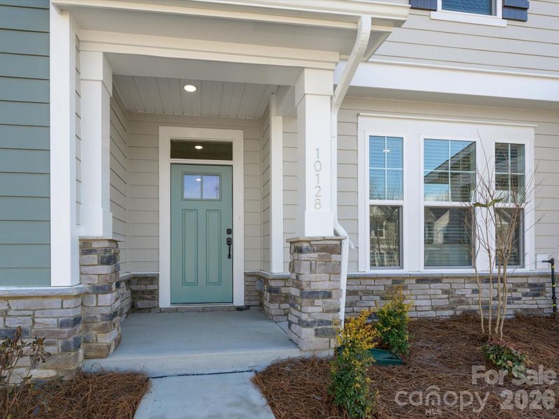 Exterior details and patio area of a home in North Creek Village, Huntersville (Image 3).