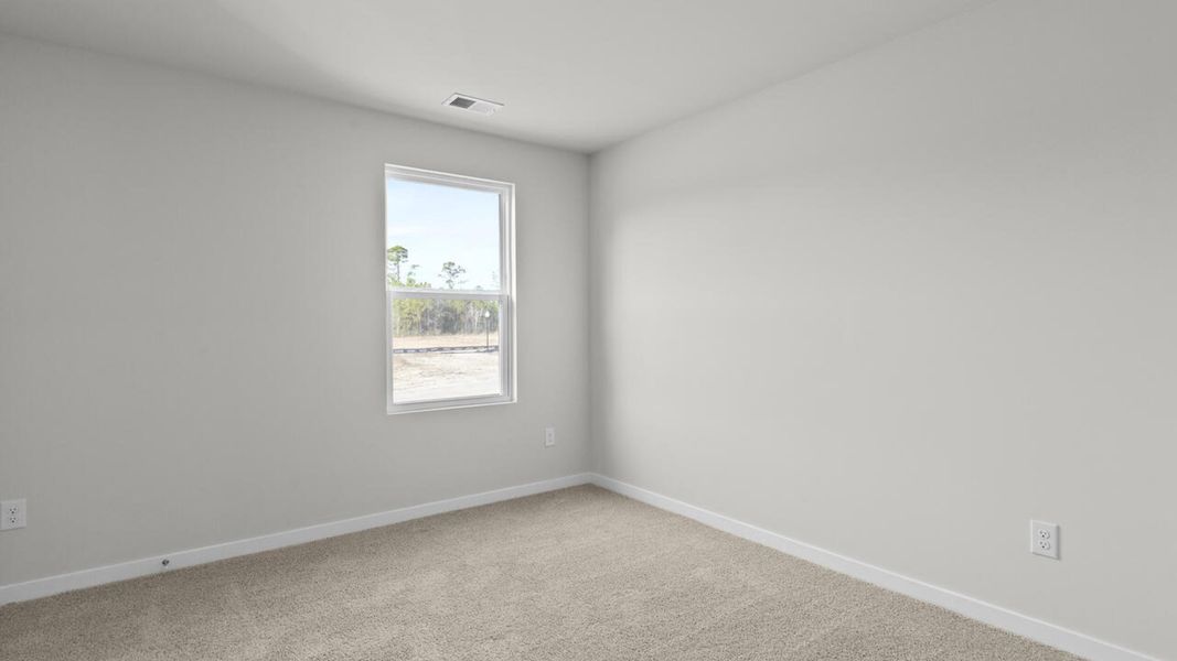Spacious, unfurnished interior of a new home in Sidbury Station, Castle Hayne (Image 27).