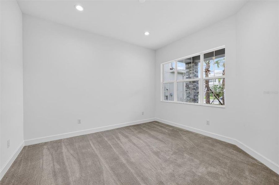 Spacious, unfurnished interior of a new home in Winding Ridge, Wesley Chapel (Image 29).